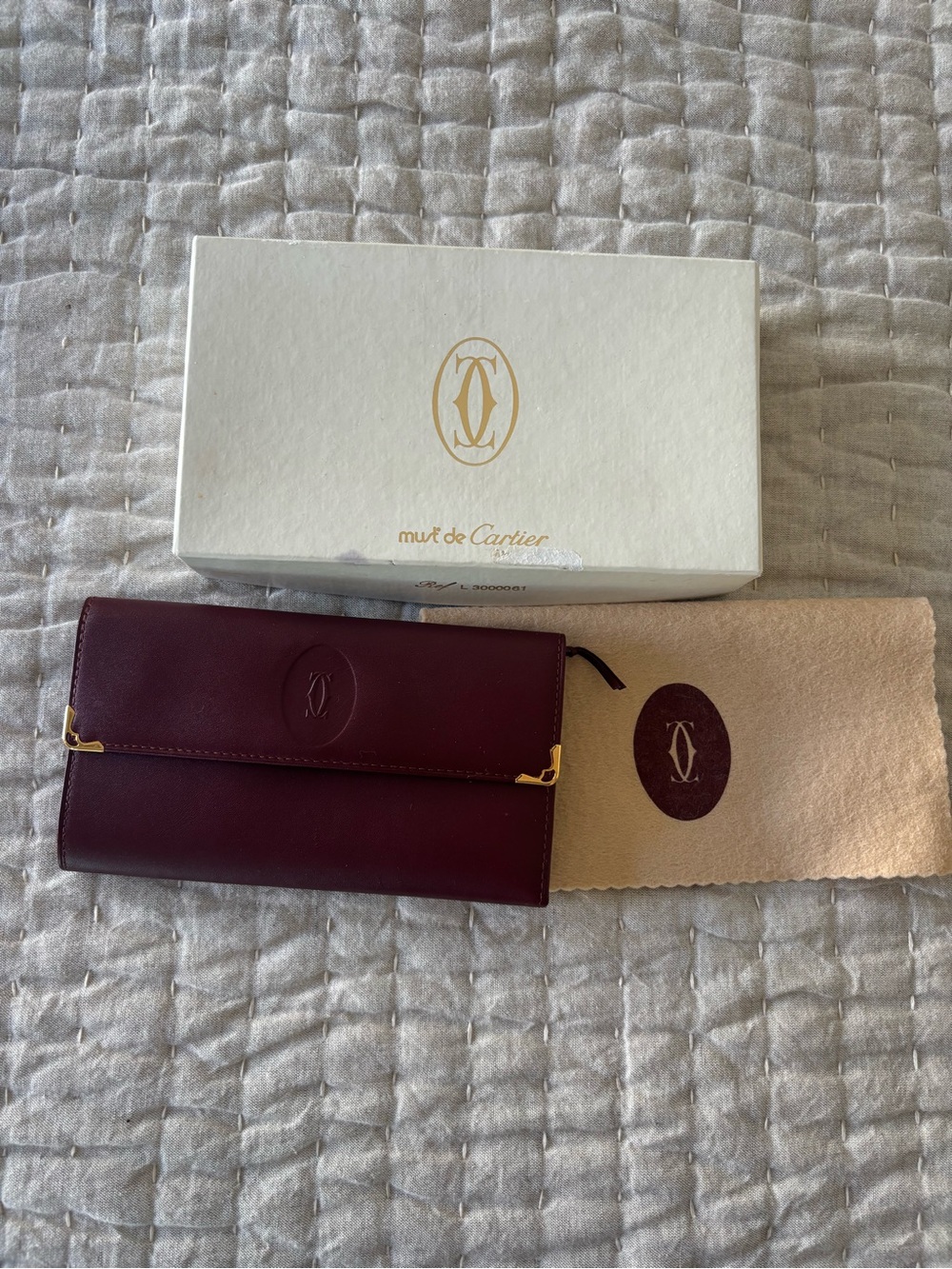 Cartier Burgundy Leather Continental Wallet with Gold Accents